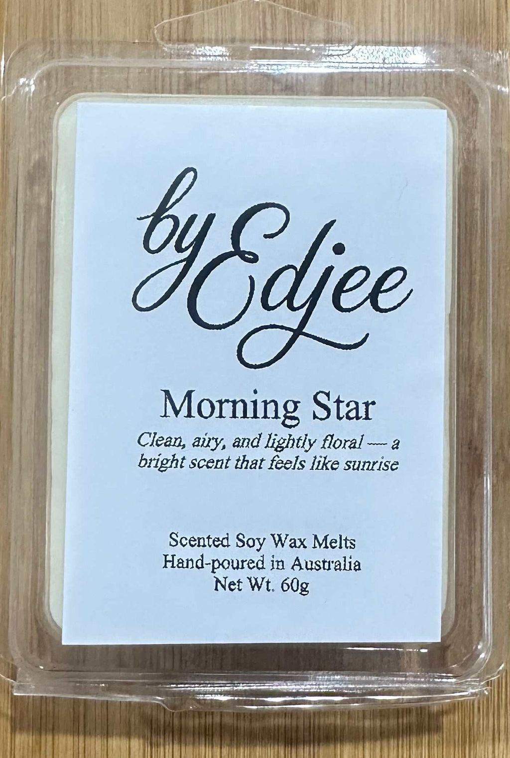 Morning Star soy wax melt with clean, airy, lightly floral scent by Edjee in clear clamshell packaging