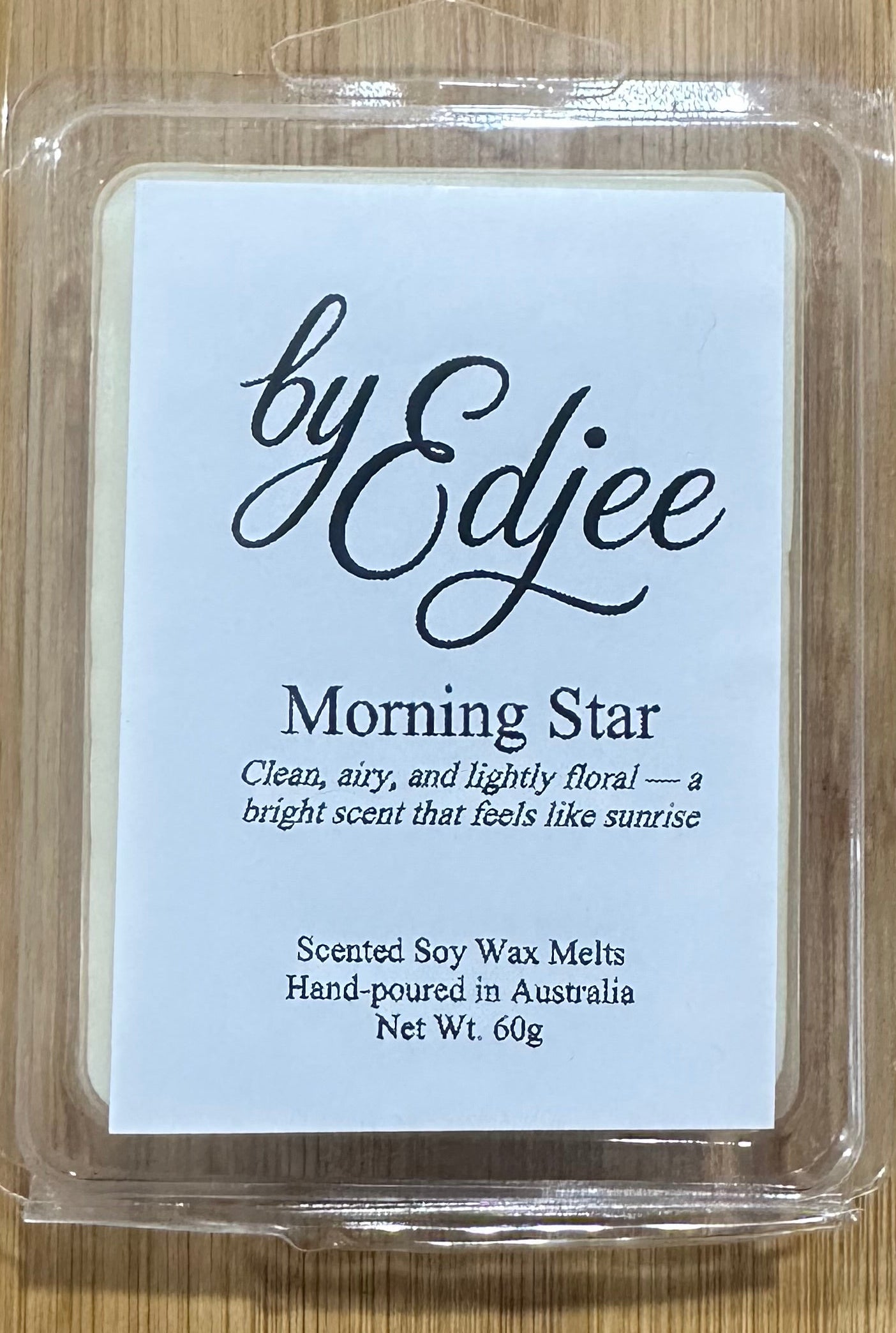 Morning Star soy wax melt with clean, airy, lightly floral scent by Edjee in clear clamshell packaging