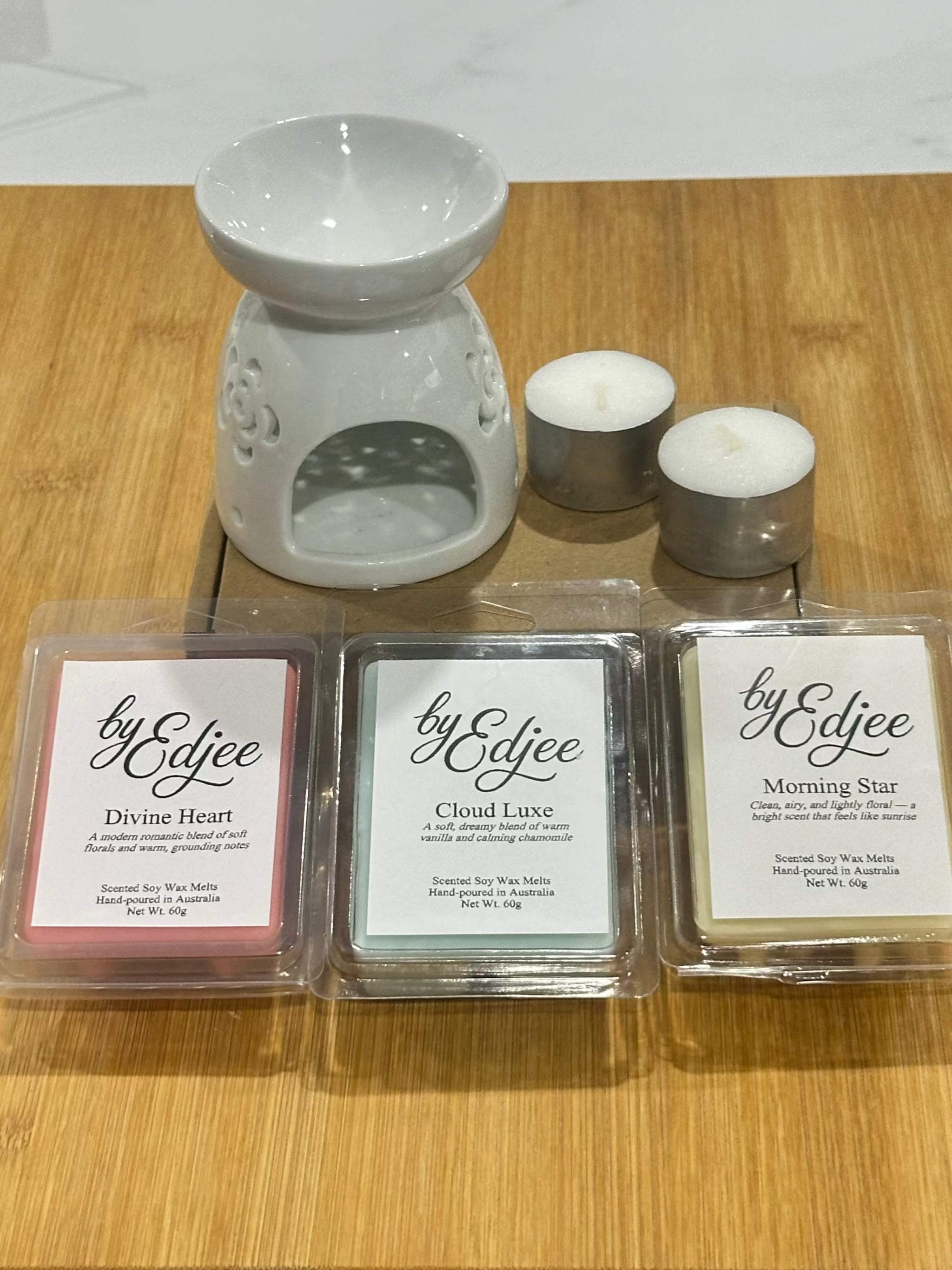 Wax Melt Starter Pack with ceramic warmer, assorted hand-poured wax melts, and tealights for home fragrance